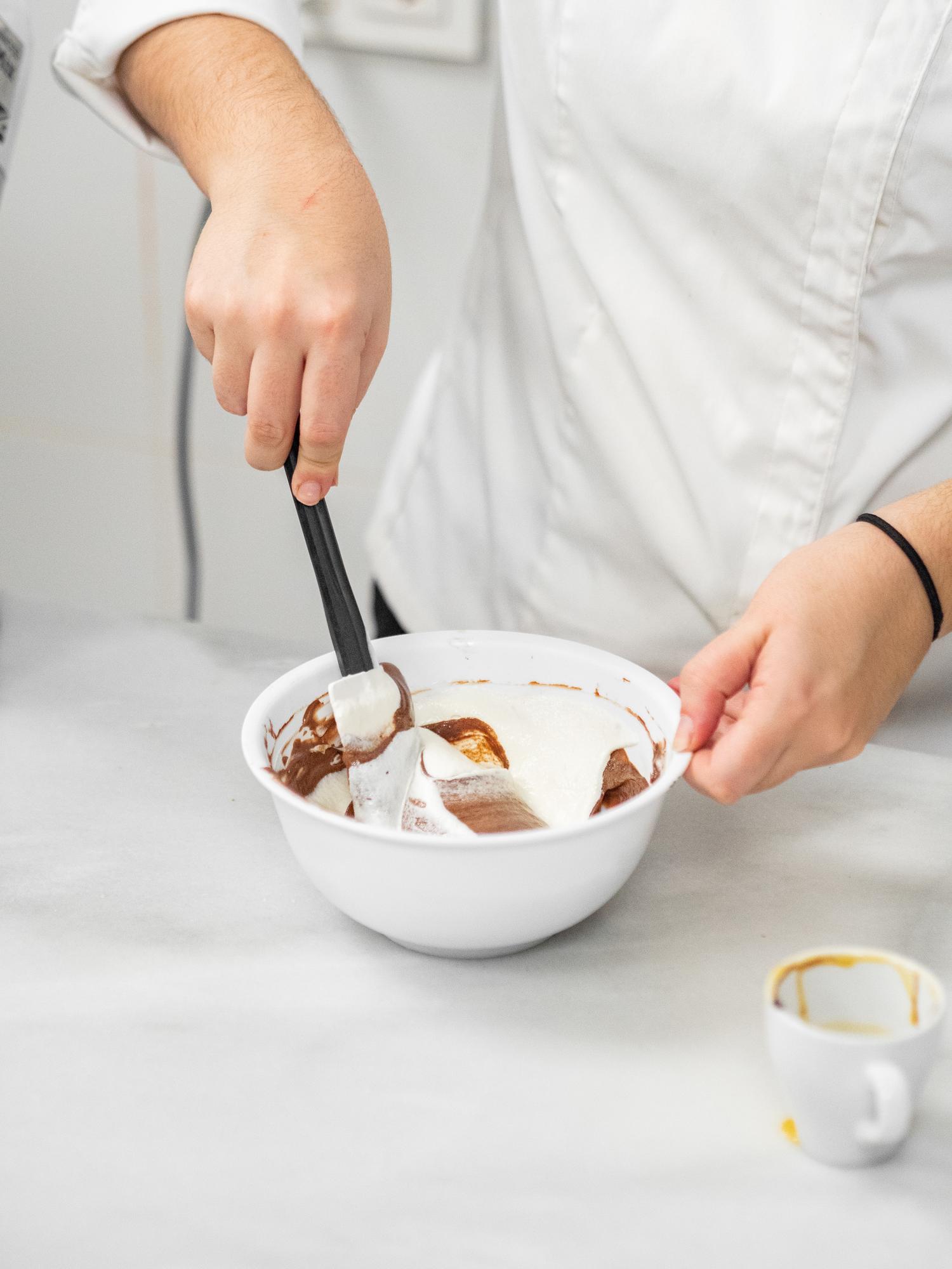 Pastry chef decorating dessert